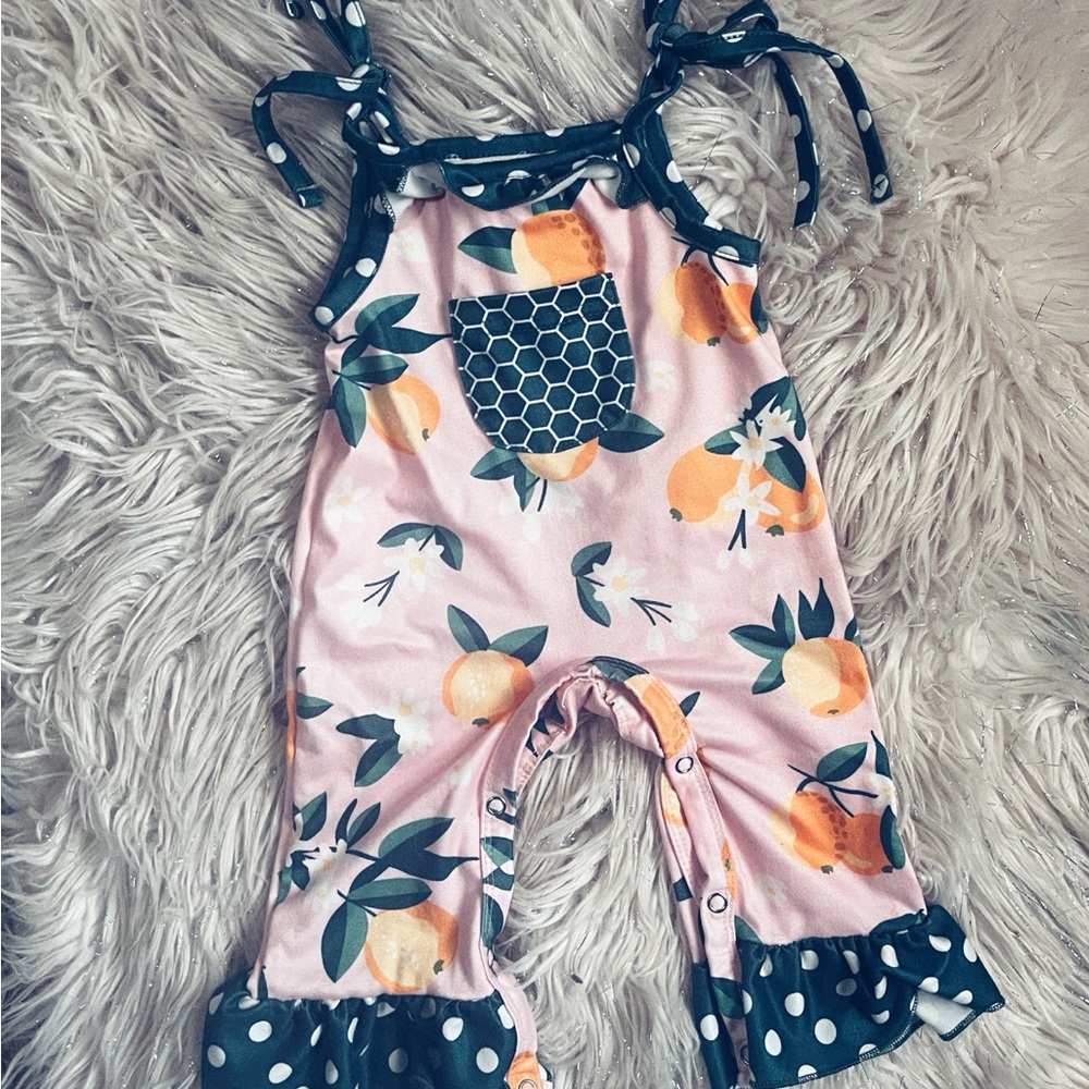 Peach Print Kids Romper with Polka Dot Accents